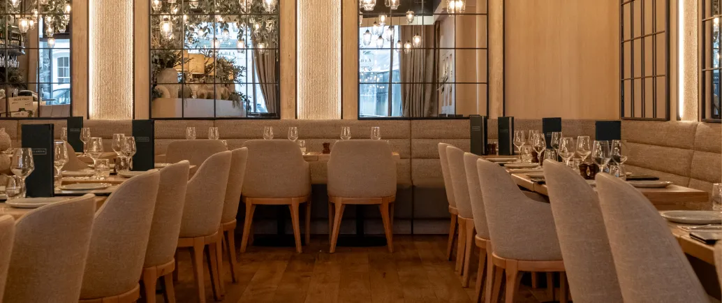 Grilandia Mayfair's elegant interior with a refined dining setup